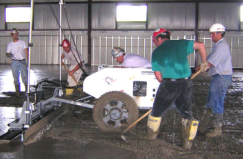 B&B Concrete Palcement Inc. employees installing concrete in a warehouse